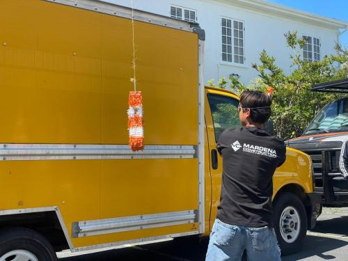 Michael R, taking his turn at the piñata (he missed, a lot, lol)